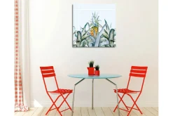 Canvastavla - Ananas omgiven av gröna växter